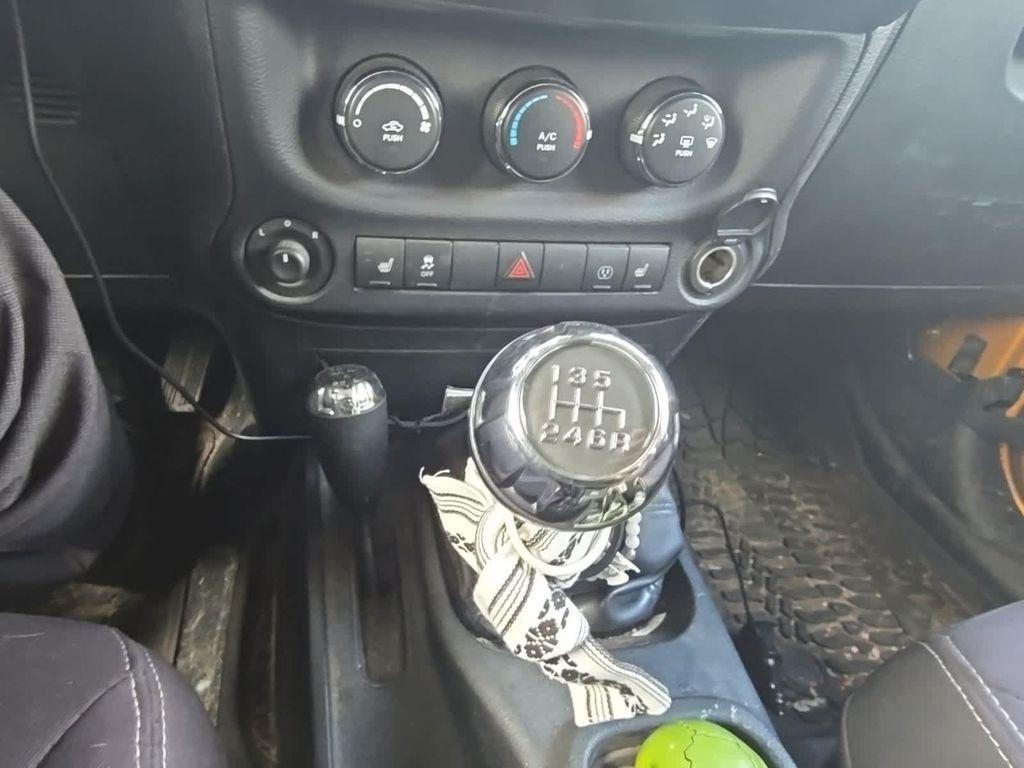 used 2014 Jeep Wrangler Unlimited car, priced at $14,990