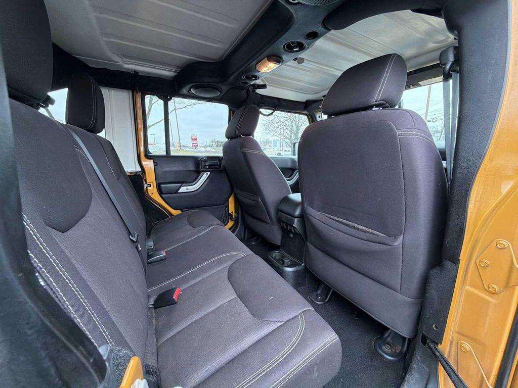 used 2014 Jeep Wrangler Unlimited car, priced at $14,990