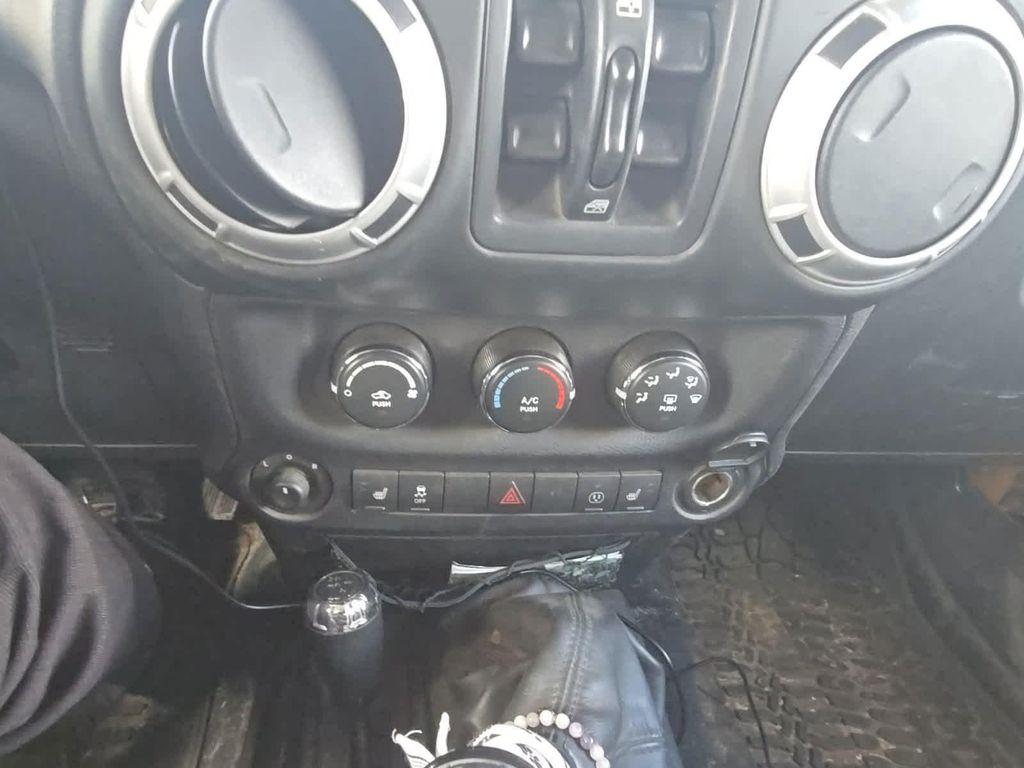 used 2014 Jeep Wrangler Unlimited car, priced at $14,990