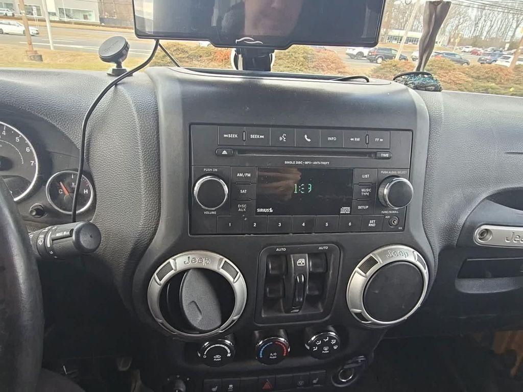 used 2014 Jeep Wrangler Unlimited car, priced at $14,990