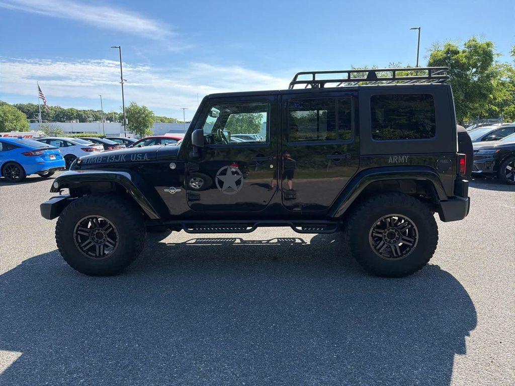 used 2013 Jeep Wrangler Unlimited car, priced at $14,189