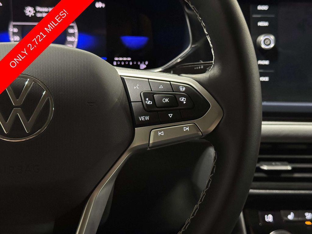 used 2024 Volkswagen Taos car, priced at $25,987