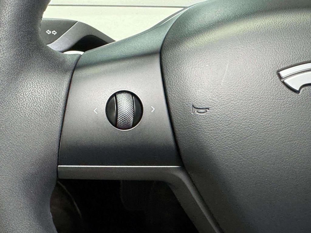 used 2023 Tesla Model 3 car, priced at $24,495