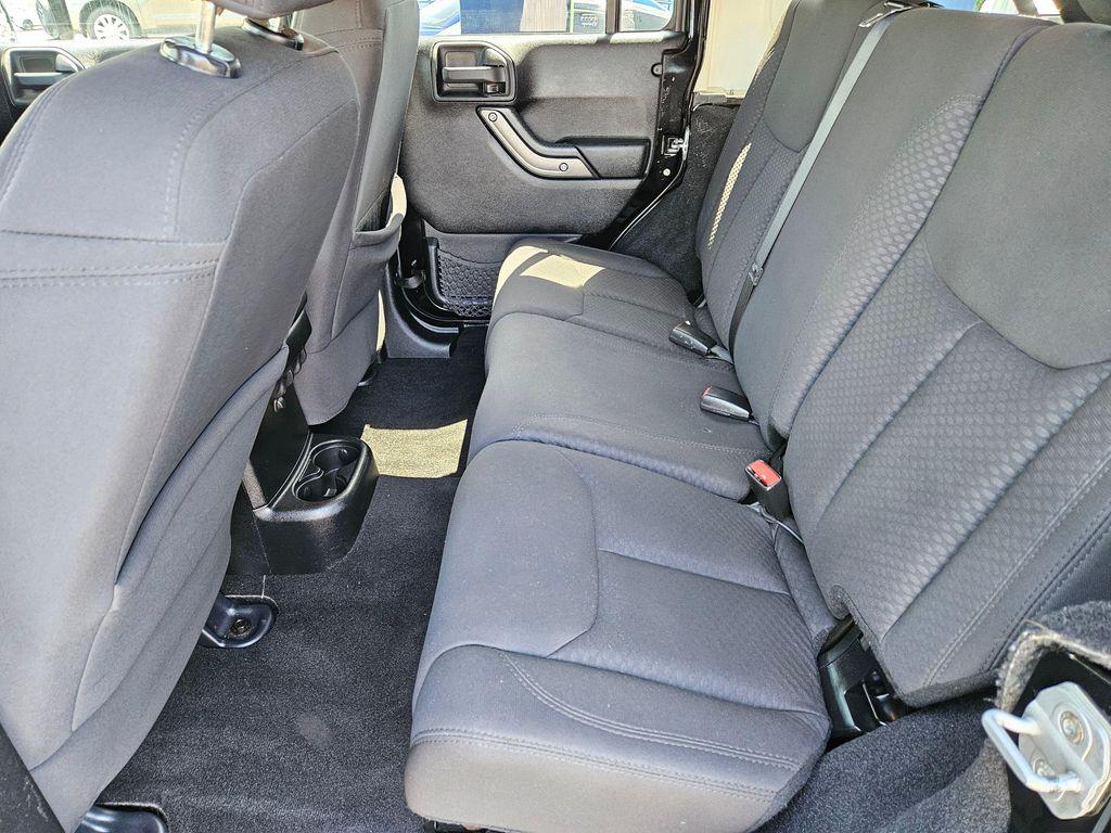 used 2013 Jeep Wrangler Unlimited car, priced at $11,499
