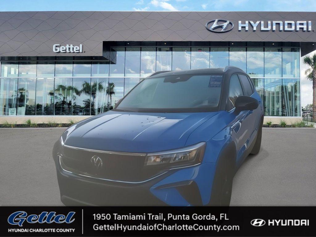 used 2024 Volkswagen Taos car, priced at $15,906