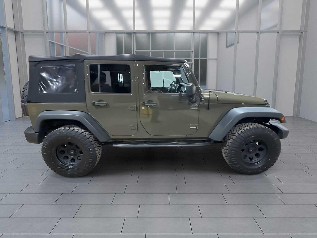 used 2015 Jeep Wrangler Unlimited car, priced at $17,695