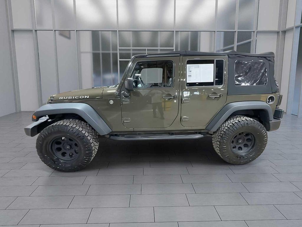 used 2015 Jeep Wrangler Unlimited car, priced at $17,695