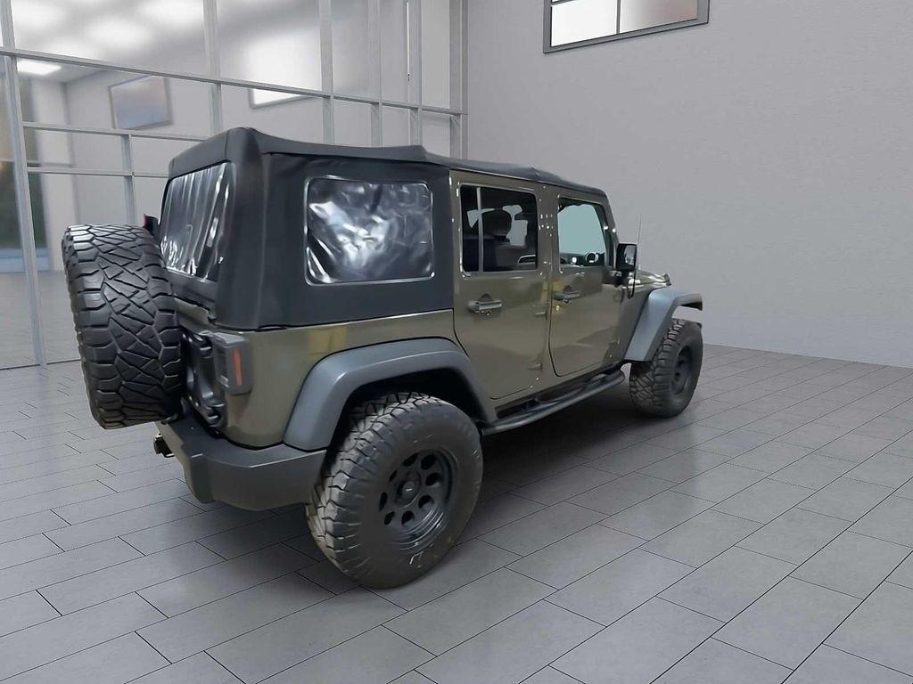 used 2015 Jeep Wrangler Unlimited car, priced at $17,695