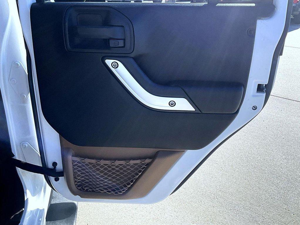 used 2013 Jeep Wrangler Unlimited car, priced at $19,640