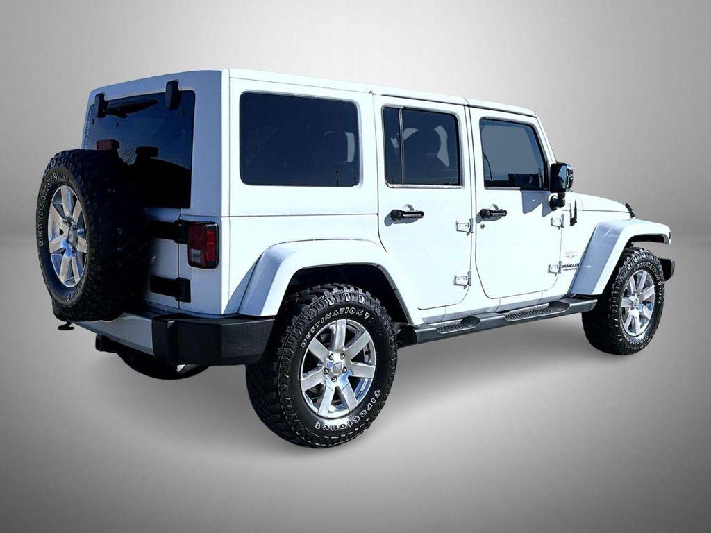 used 2013 Jeep Wrangler Unlimited car, priced at $19,640