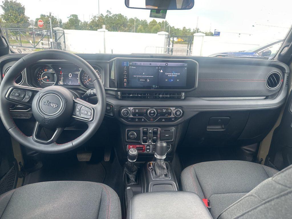 used 2025 Jeep Wrangler car, priced at $40,099