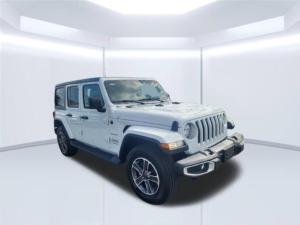 used 2023 Jeep Wrangler car, priced at $22,662