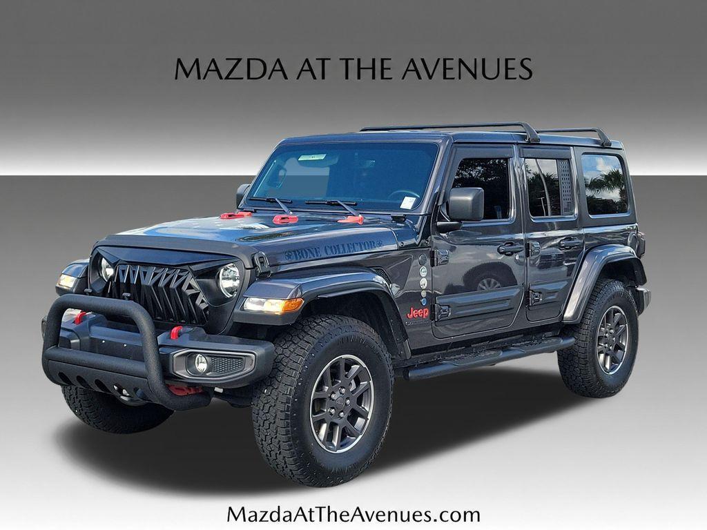 used 2021 Jeep Wrangler Unlimited car, priced at $23,977