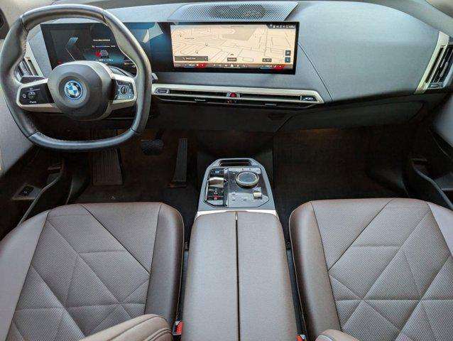 used 2024 BMW iX car, priced at $44,698