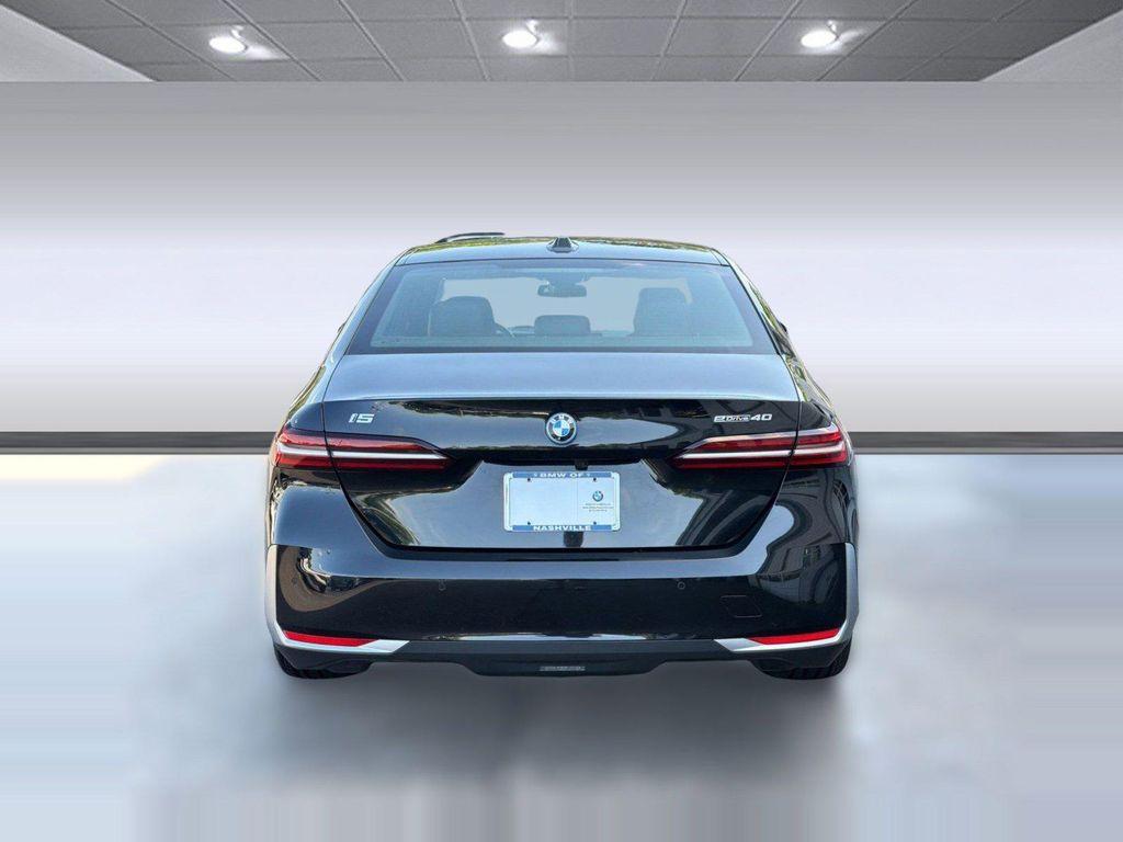 used 2024 BMW i5 car, priced at $45,297