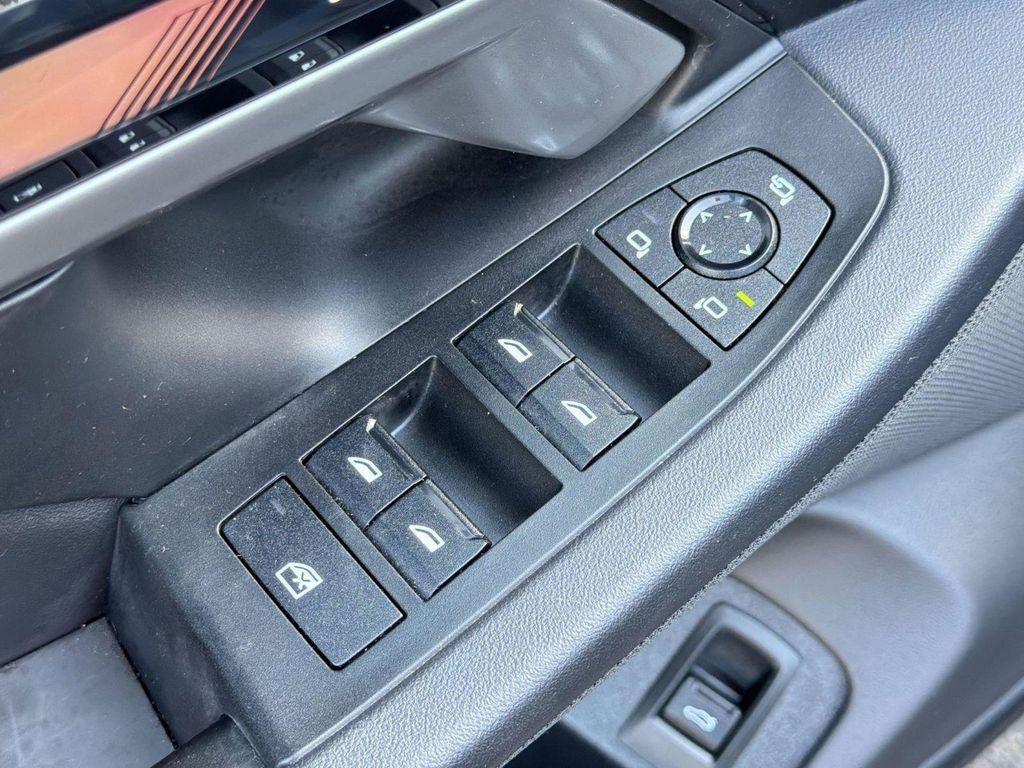used 2024 BMW i5 car, priced at $45,297