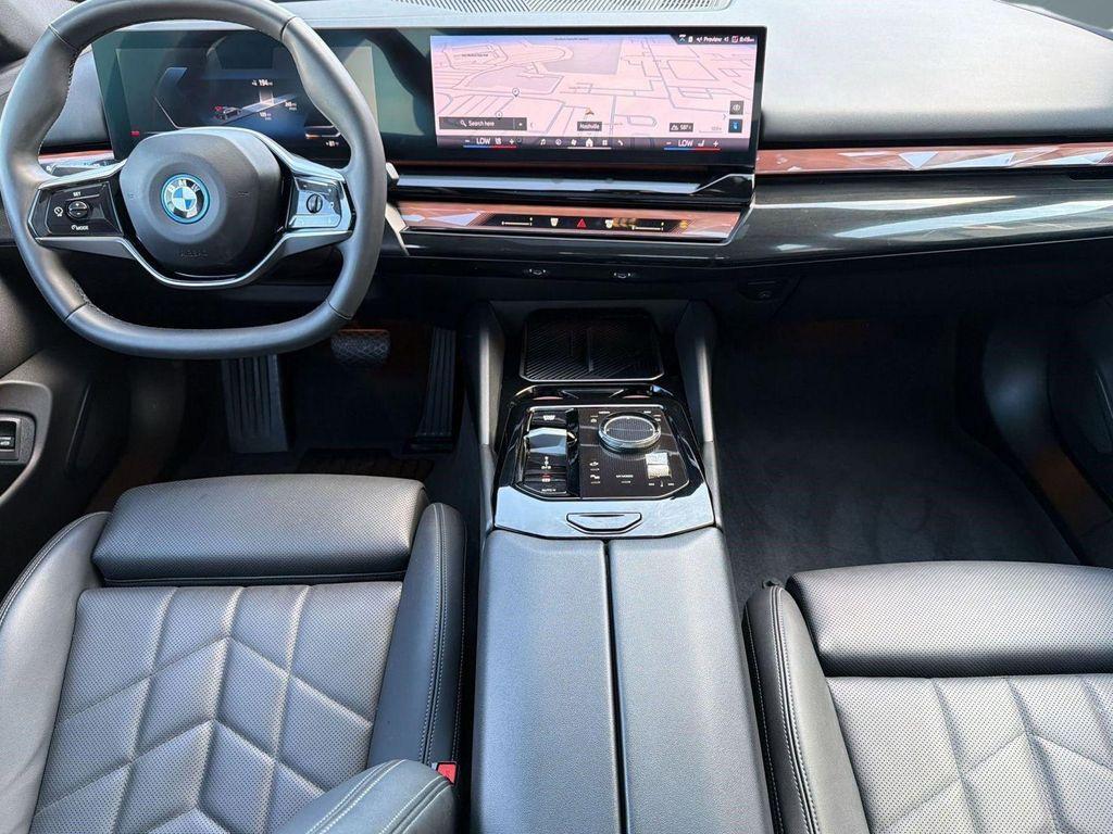 used 2024 BMW i5 car, priced at $45,297