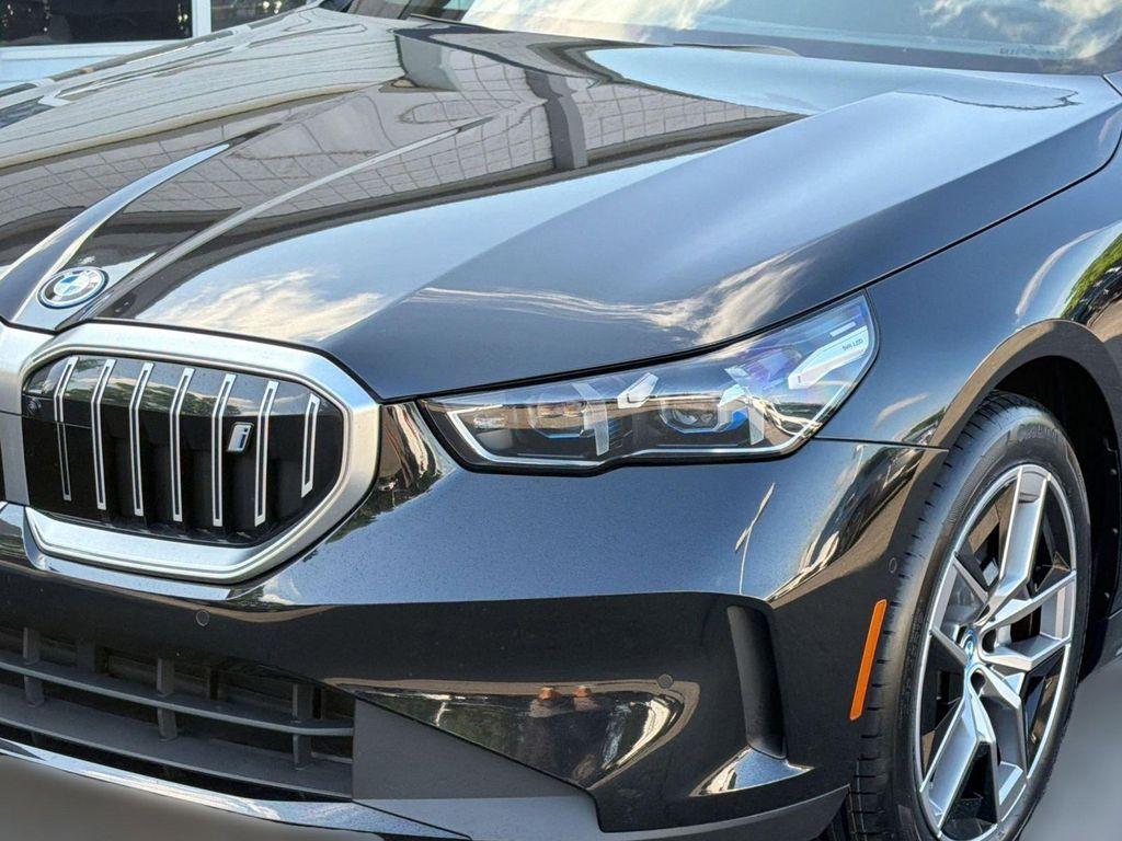 used 2024 BMW i5 car, priced at $45,297