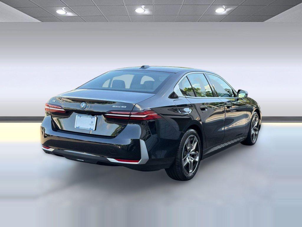 used 2024 BMW i5 car, priced at $45,297