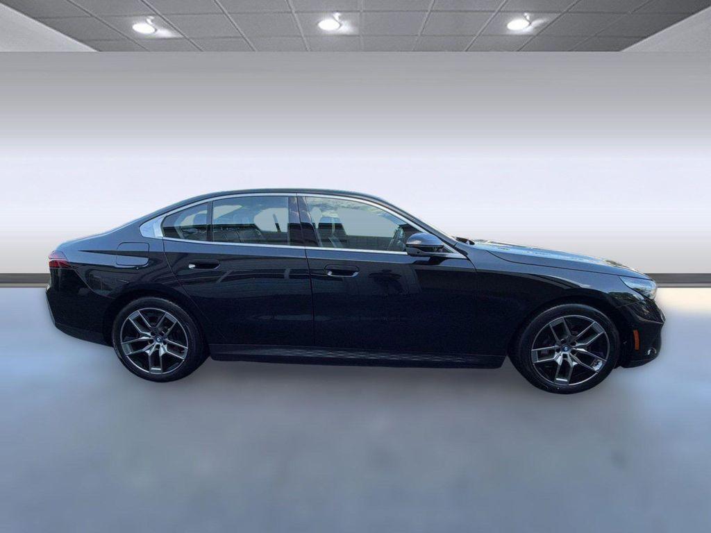 used 2024 BMW i5 car, priced at $45,297