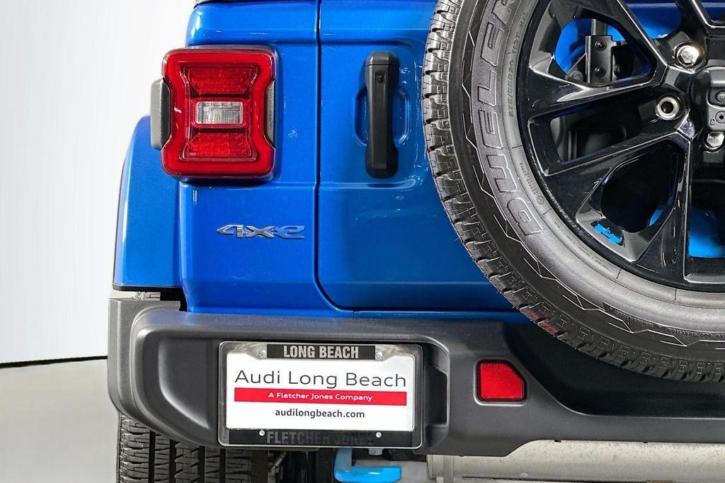 used 2023 Jeep Wrangler 4xe car, priced at $32,994