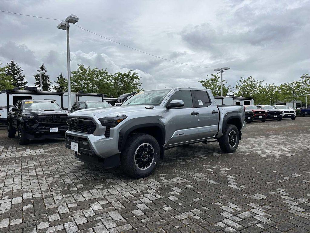 used 2025 Toyota Tacoma Hybrid car, priced at $50,491