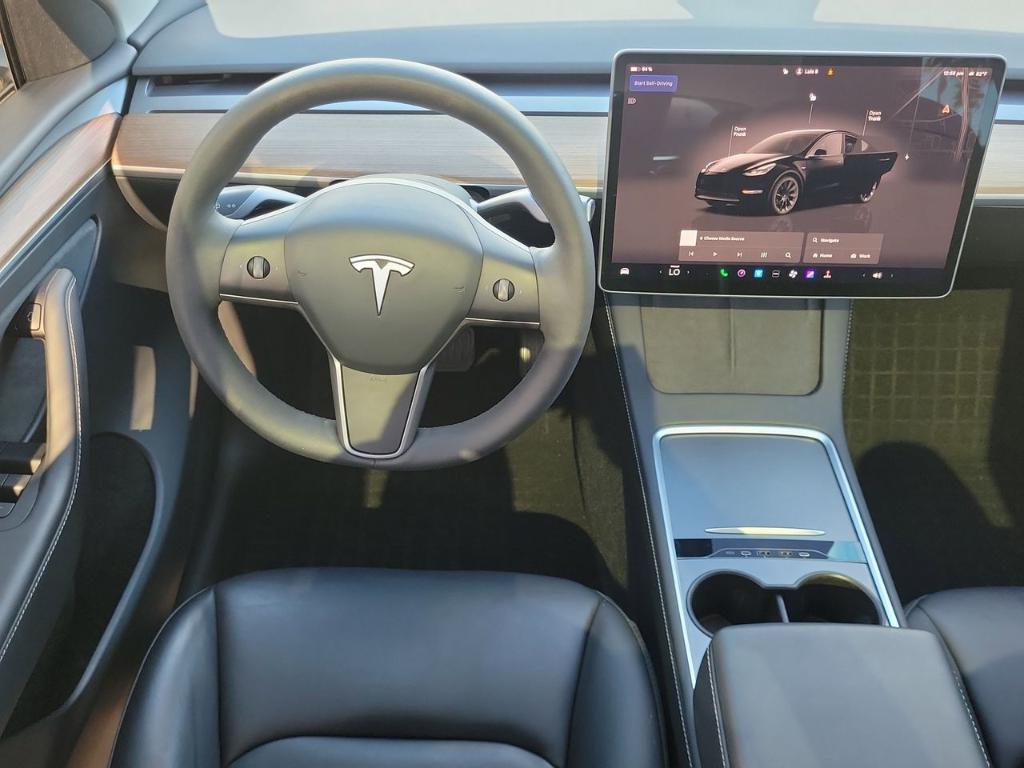 used 2024 Tesla Model Y car, priced at $33,821