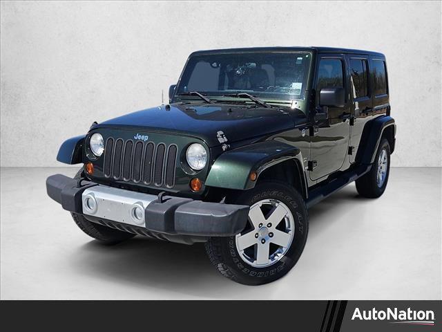 used 2011 Jeep Wrangler Unlimited car, priced at $15,455