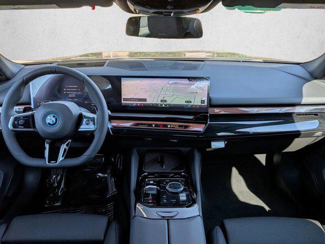 new 2026 BMW 550e car, priced at $85,899