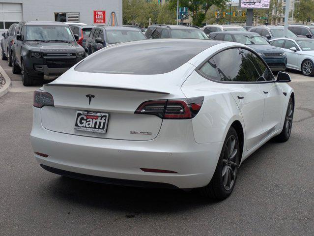used 2022 Tesla Model 3 car, priced at $27,693