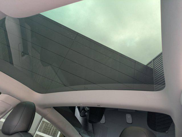 used 2022 Tesla Model 3 car, priced at $27,693