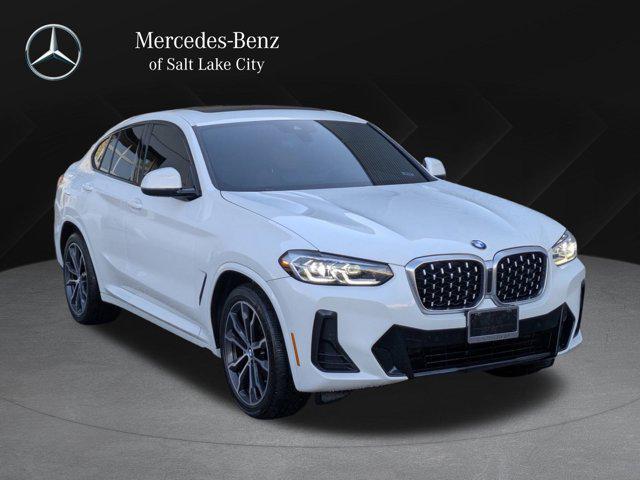 used 2022 BMW X4 car, priced at $33,495