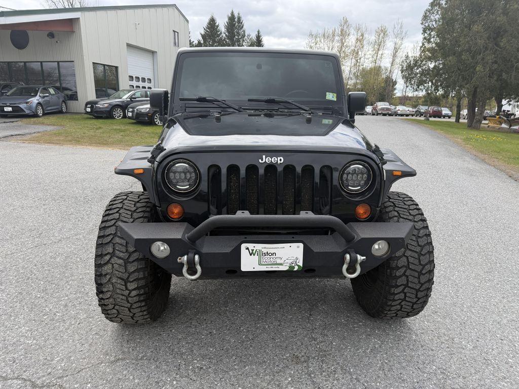 used 2011 Jeep Wrangler Unlimited car, priced at $13,895