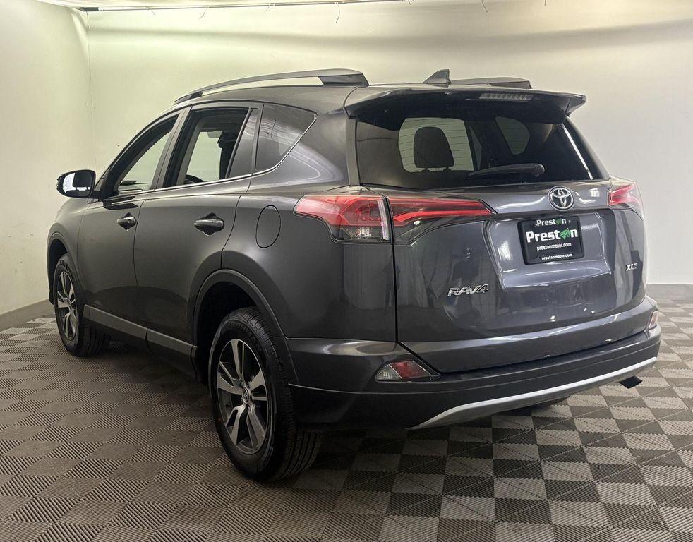 used 2018 Toyota RAV4 car, priced at $12,000