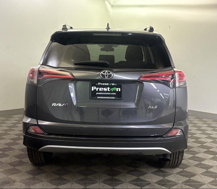 used 2018 Toyota RAV4 car, priced at $12,000