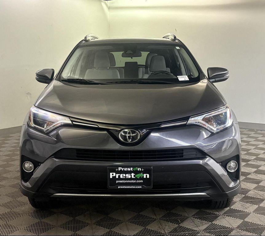 used 2018 Toyota RAV4 car, priced at $12,000