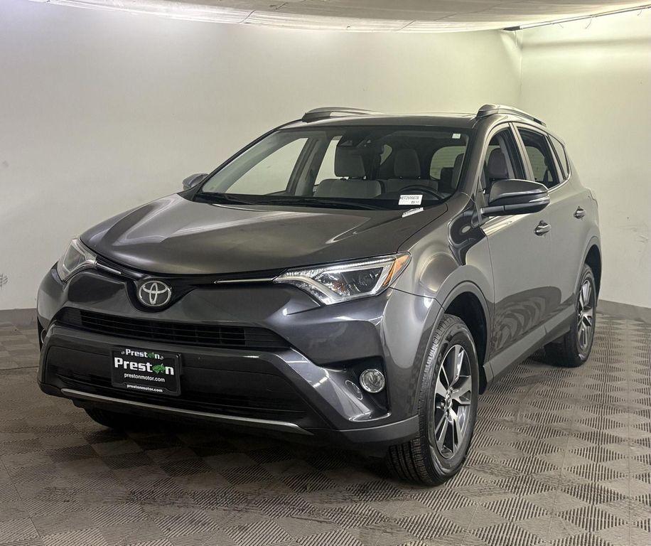 used 2018 Toyota RAV4 car, priced at $12,000