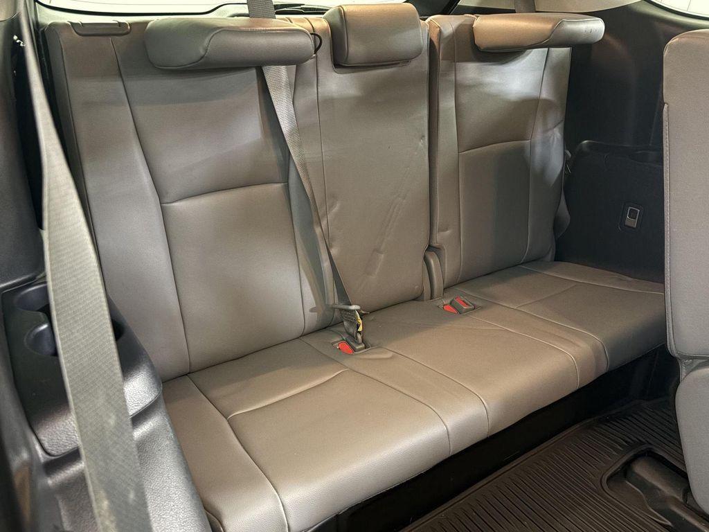 used 2021 Toyota Highlander Hybrid car, priced at $28,500