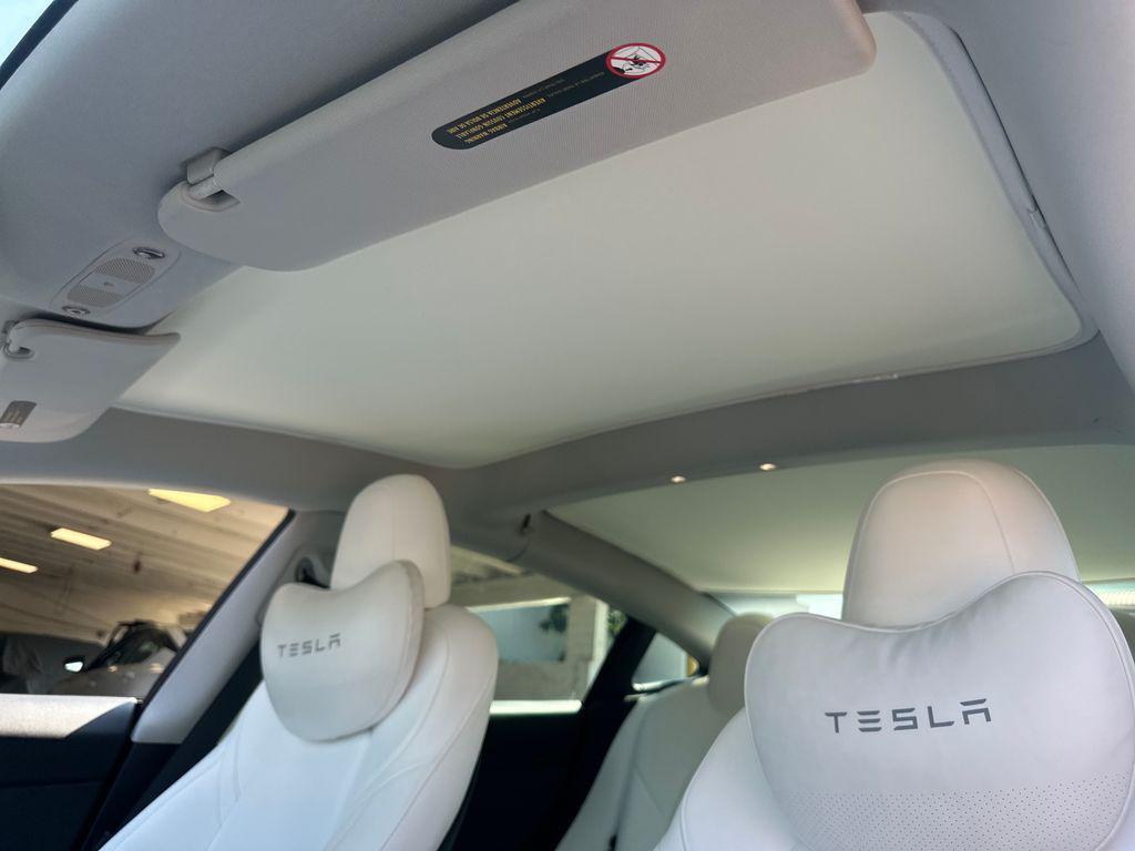 used 2023 Tesla Model 3 car, priced at $31,500