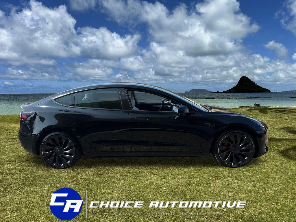used 2023 Tesla Model 3 car, priced at $31,500