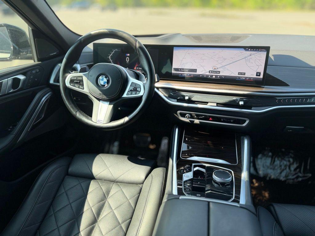 used 2024 BMW X6 car, priced at $67,045