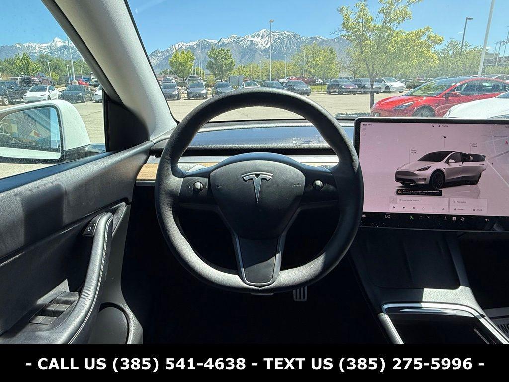 used 2022 Tesla Model Y car, priced at $33,173