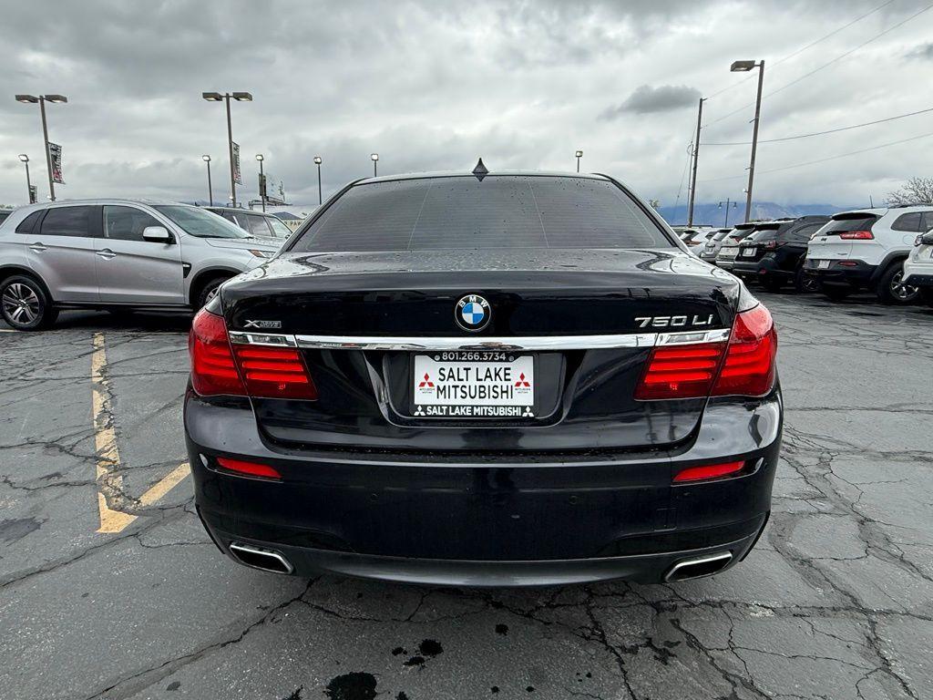 used 2015 BMW 750 car, priced at $16,239