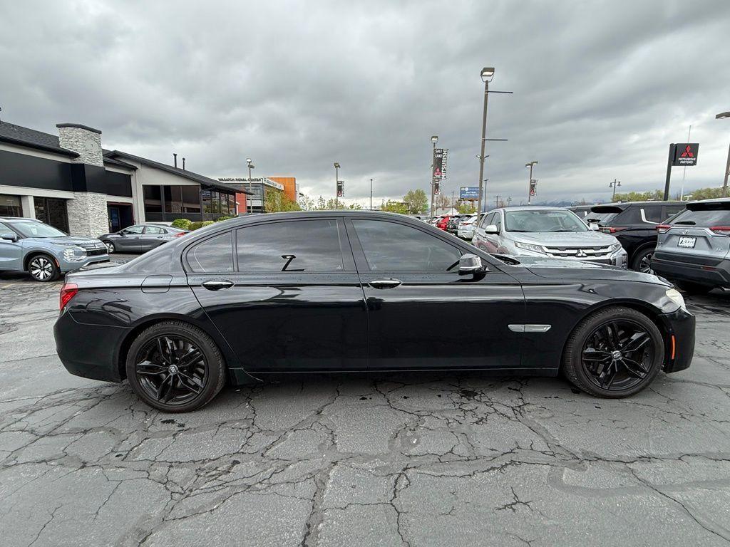 used 2015 BMW 750 car, priced at $16,239