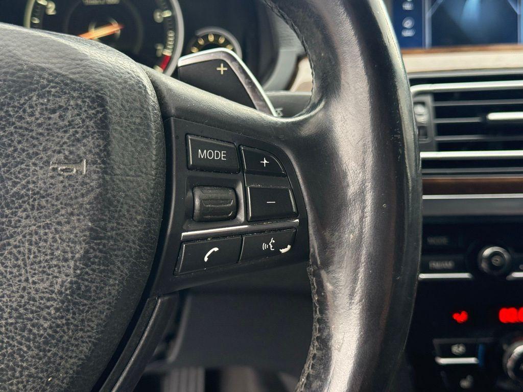 used 2015 BMW 750 car, priced at $16,239