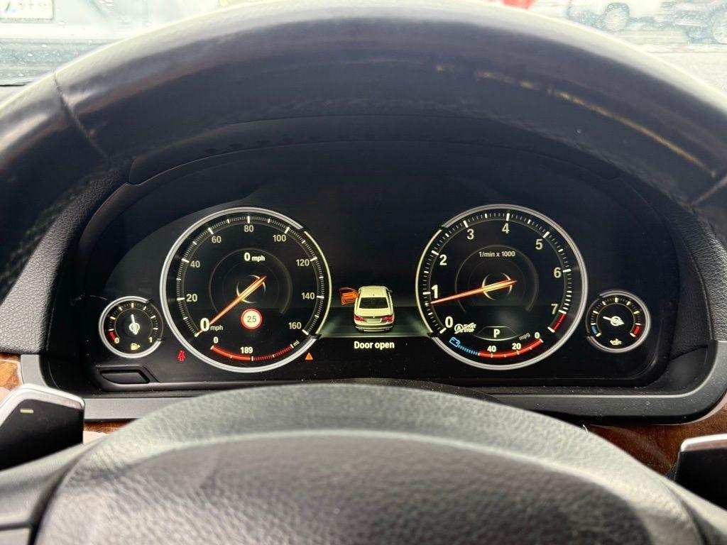 used 2015 BMW 750 car, priced at $16,239
