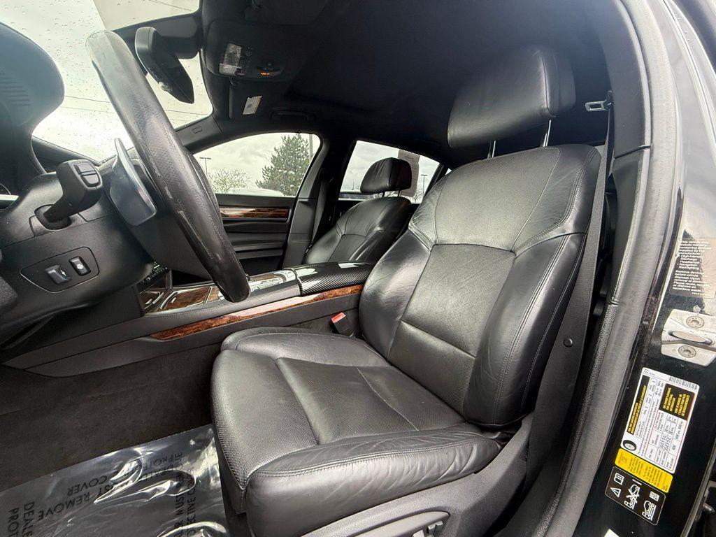 used 2015 BMW 750 car, priced at $16,239