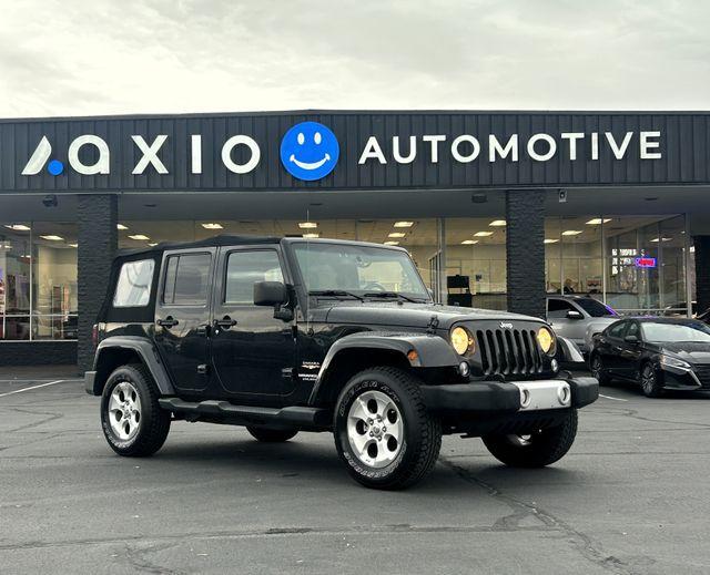 used 2014 Jeep Wrangler Unlimited car, priced at $15,977