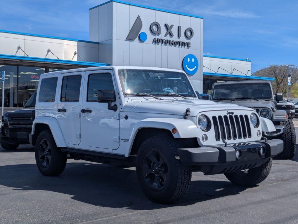 used 2015 Jeep Wrangler Unlimited car, priced at $19,677