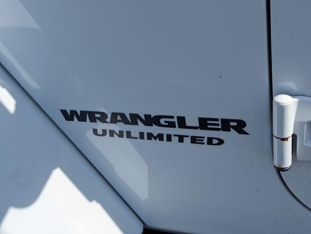 used 2015 Jeep Wrangler Unlimited car, priced at $19,677